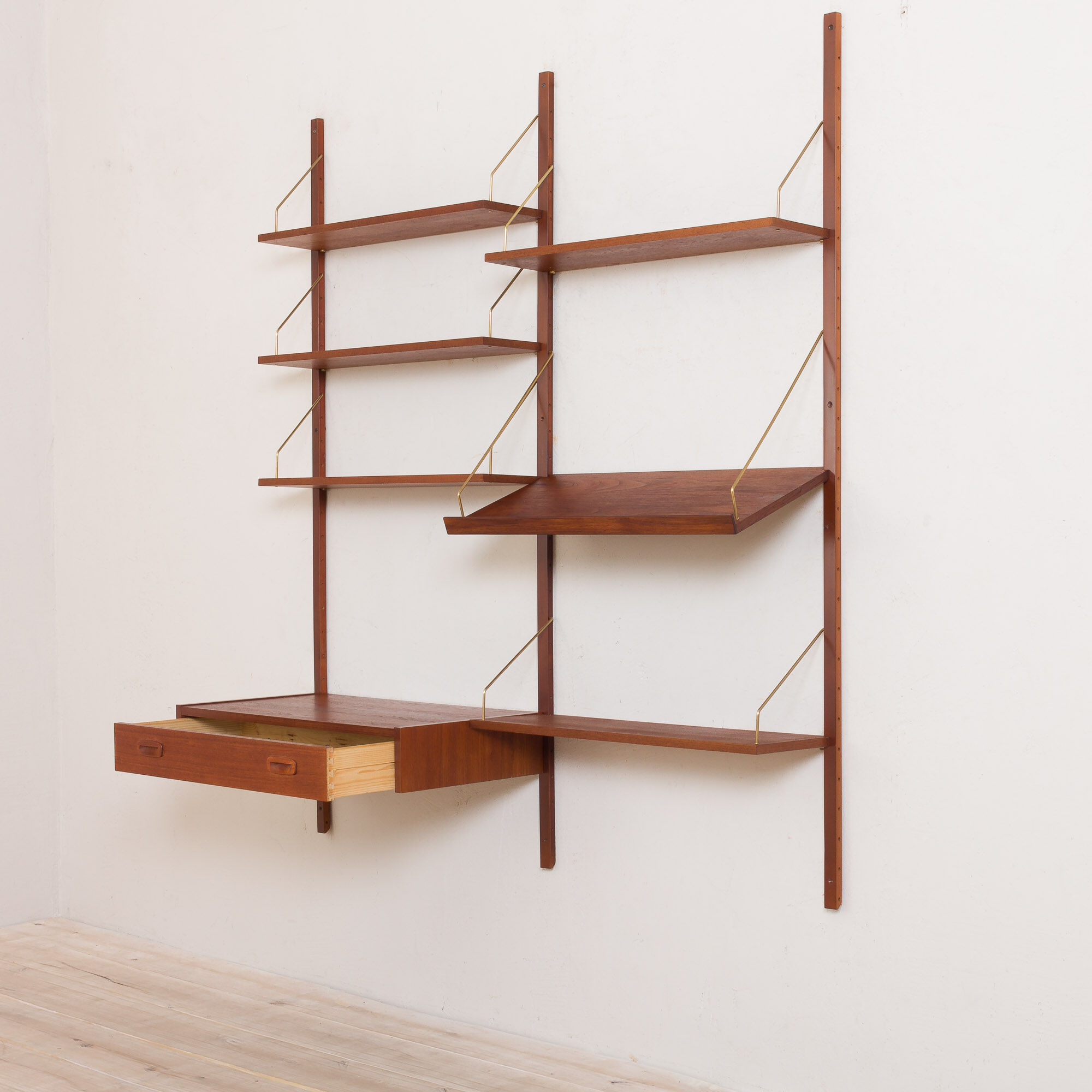Danish teak wall unit with a desk and magazine tilted shelf