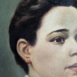 Oil on canvas portrait in an antique gilded wooden frame.