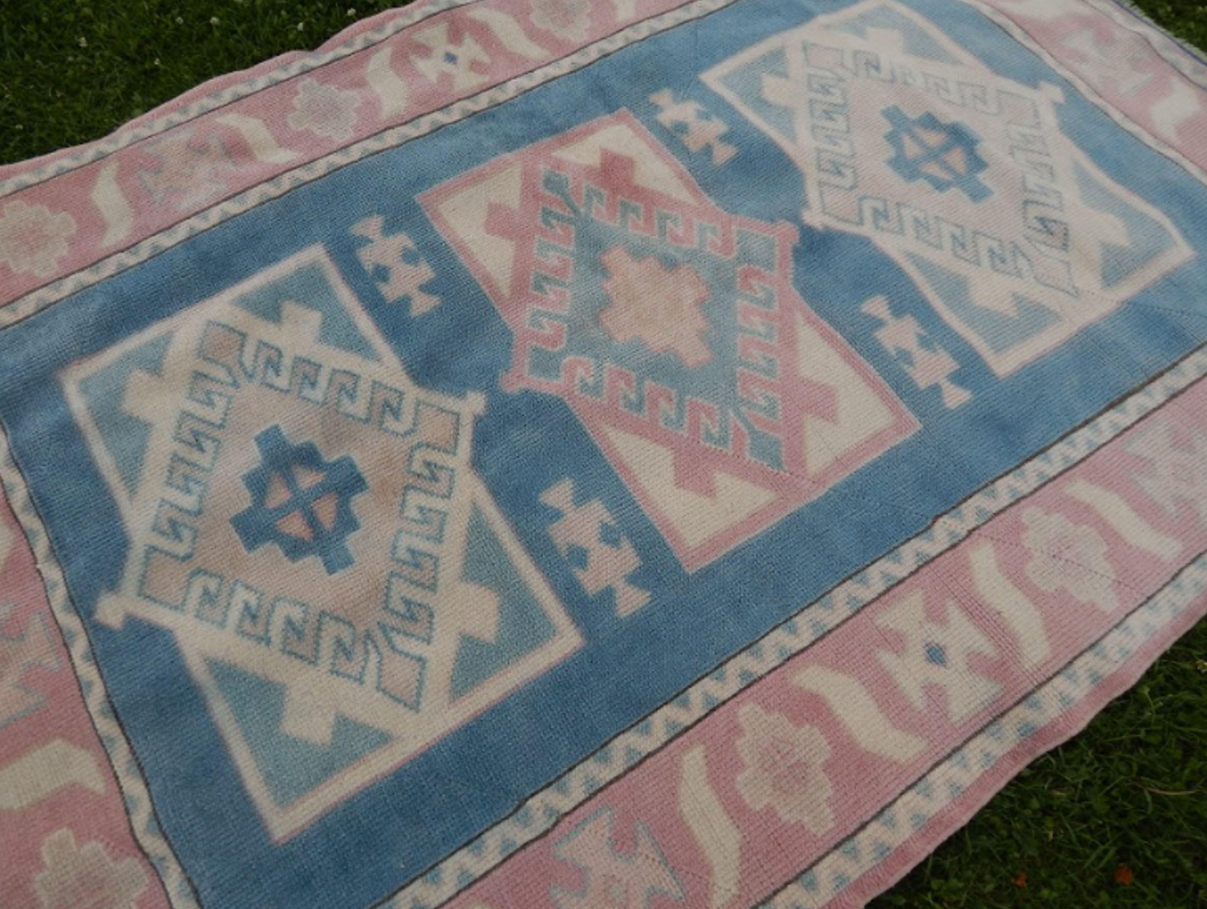 Turkish kars rug with rich border - 4′2″ × 6′2″ (128 x 188 cm)