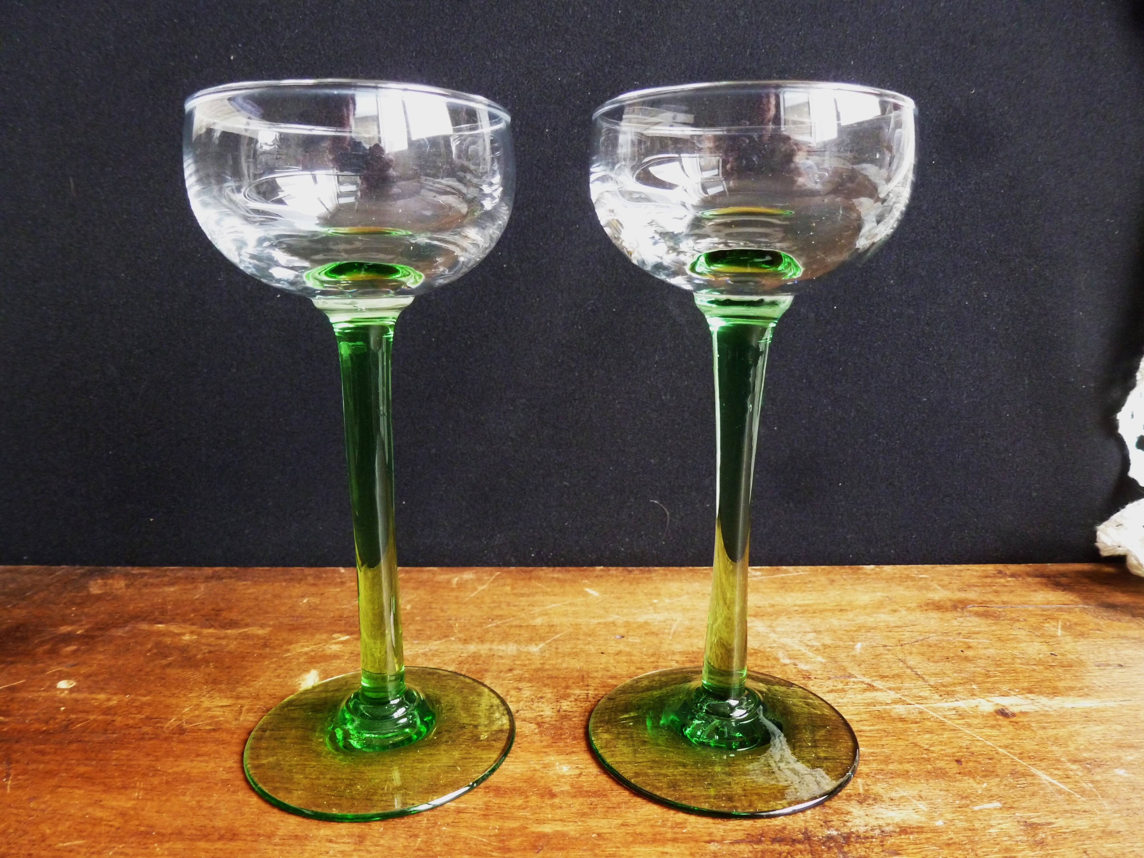 Alsace wine glasses, white wine glasses, green stemmed table glasses.