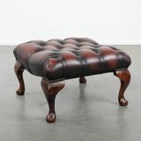 Dark brown chesterfield ottoman in cowhide leather