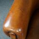 Set of 2 club chairs in black piping sheep leather
