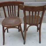 Paire de chaises bistrot anciennes avec patine foncée