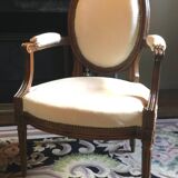 Louis XVI period cabriolet armchair with medallion back