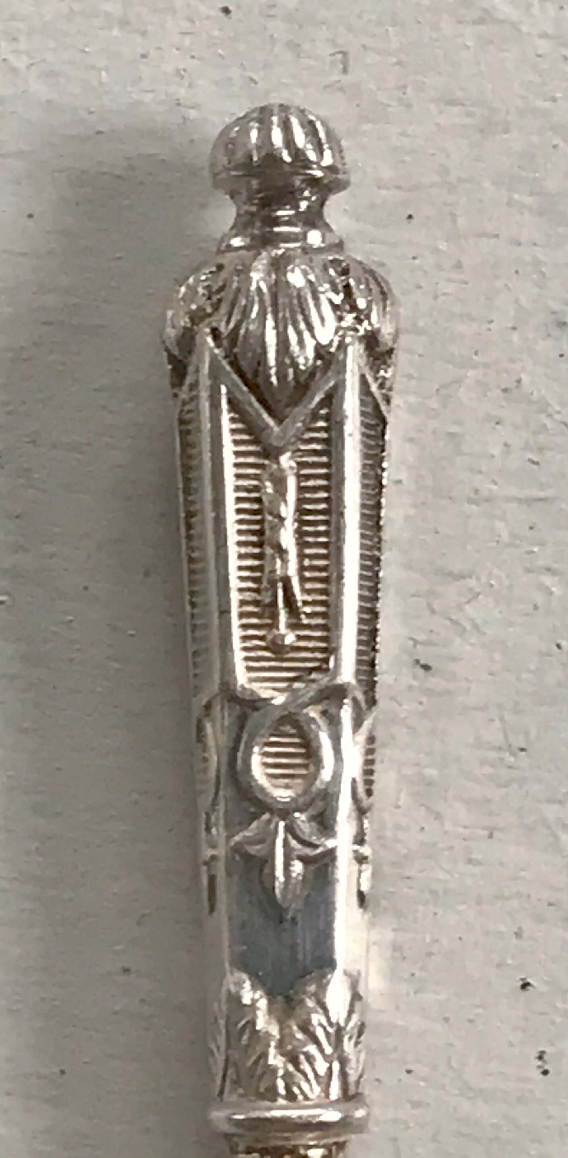 12 teaspoons silver metal