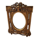 Old small golden mirror
