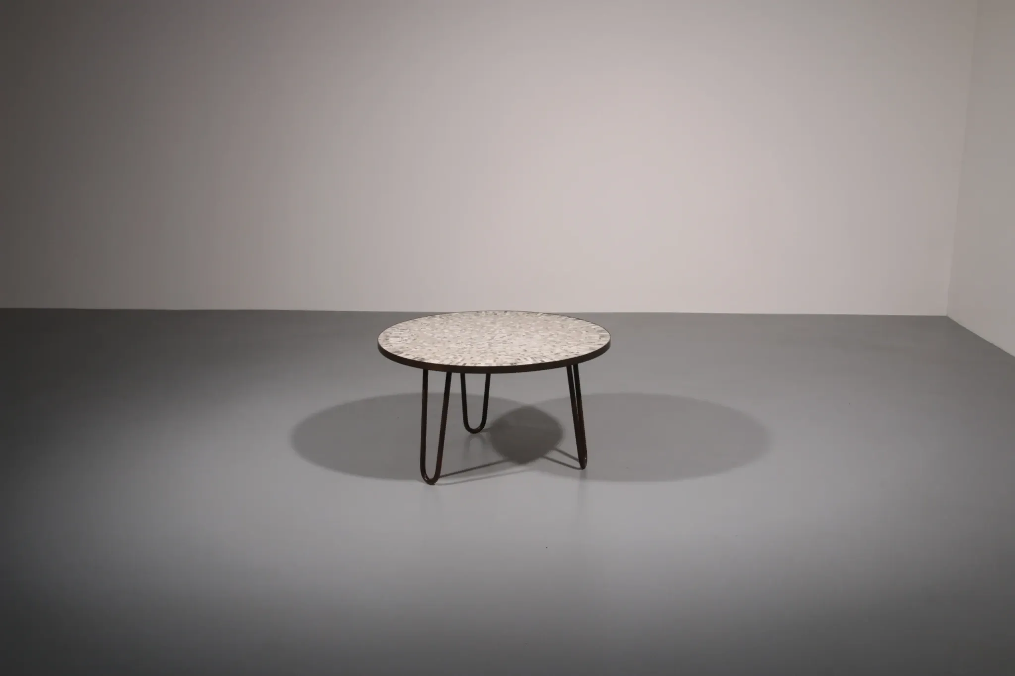 A stunning mosaic coffee table by German sculptor Berthold Müller