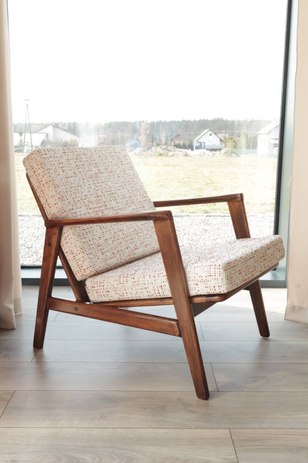 Vintage Danish boucle armchair with orange polka dots from the 1960s.