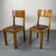 Pair of wooden and leather chairs