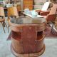 Pair of Art Deco half-moon bedside tables in walnut veneer and black marble.
