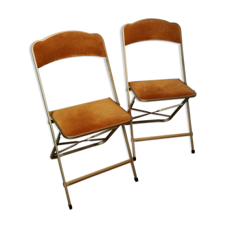 Deux chaises pliantes velours or