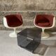 Two cognac-colored swivel chairs made of fiberglass from the 1970s