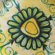 Plate decorated with yellow and green flower, signed Kerbigot.