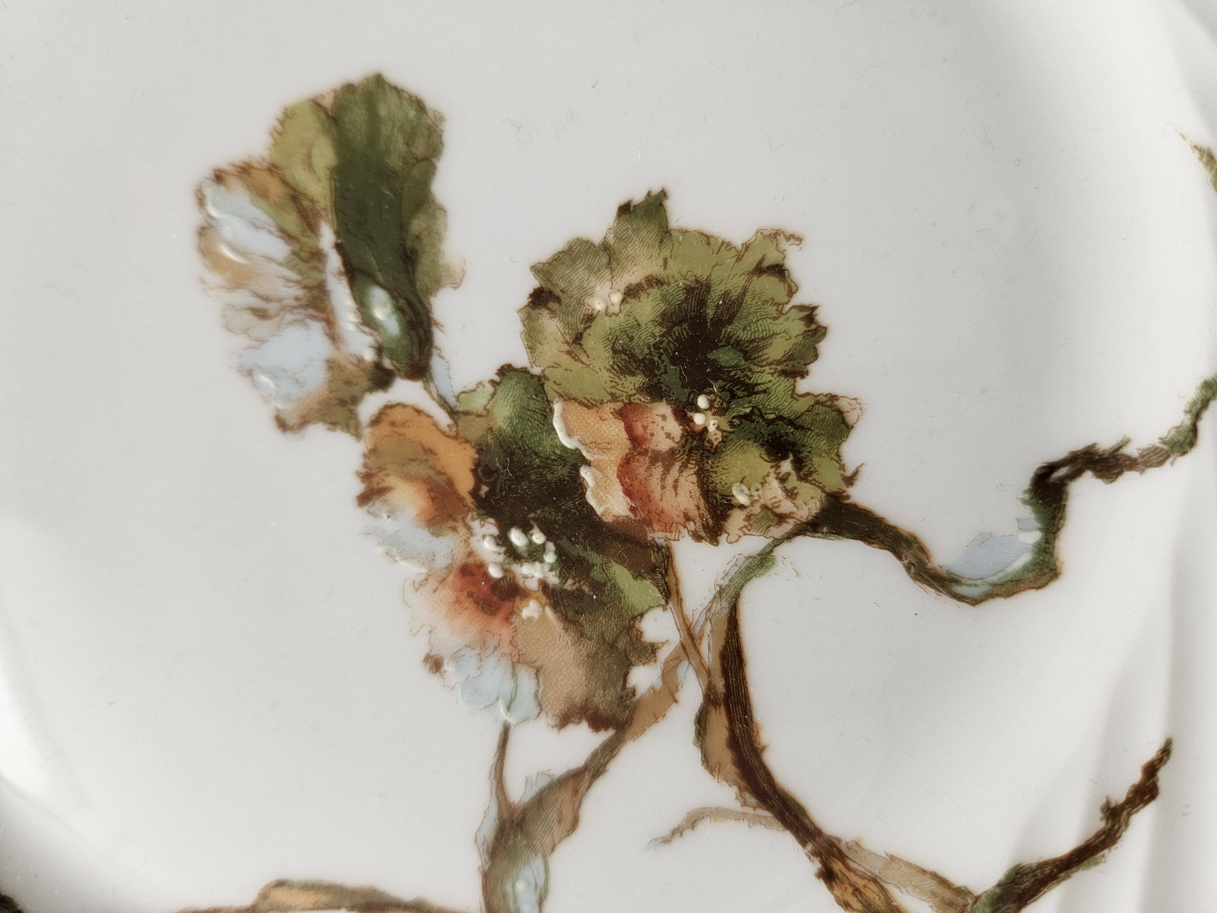 Haviland service plates, dishes on pedestals and soup tureen