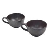 Two pitchers two cups sandstone