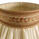 Empire style table lamp with lion heads – gilded bronze and pleated shade