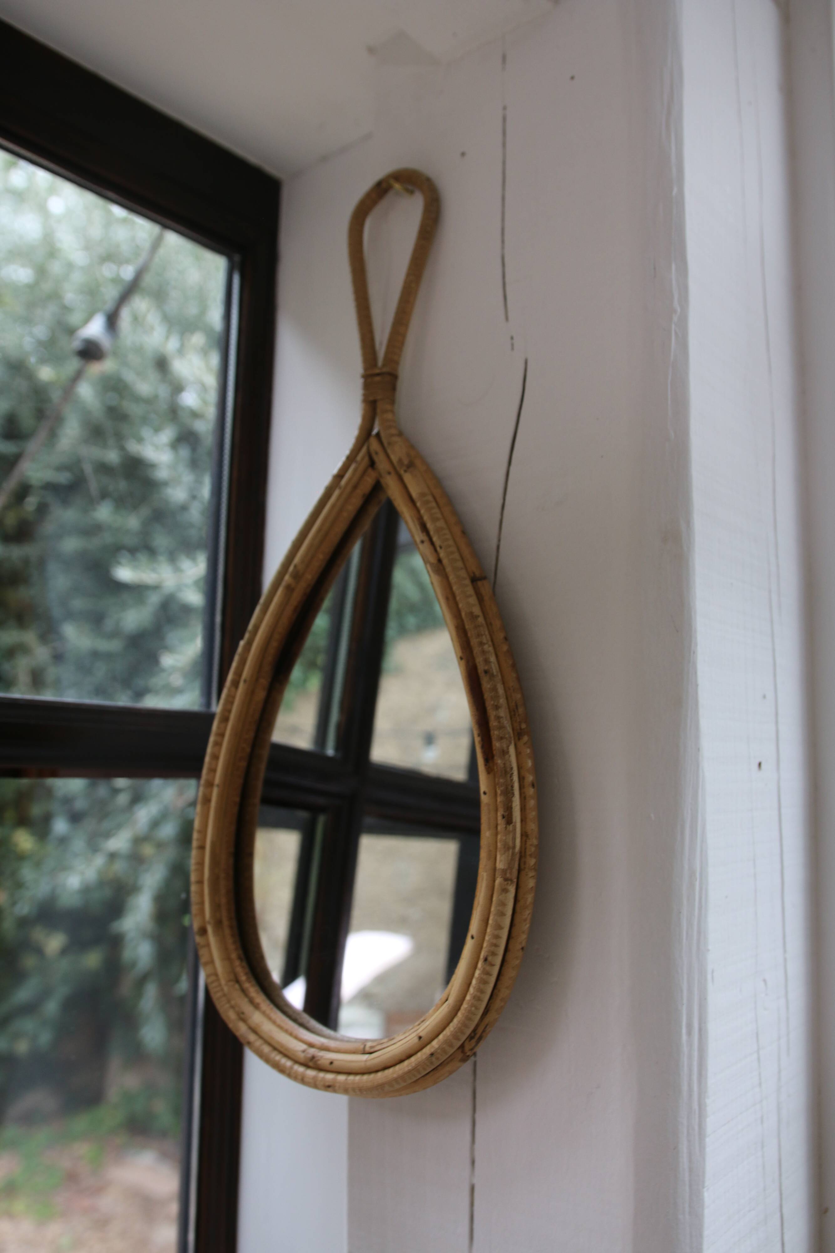 Vintage rattan teardrop mirror