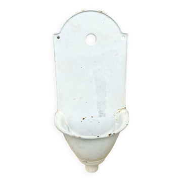 White enameled cast iron wall fountain