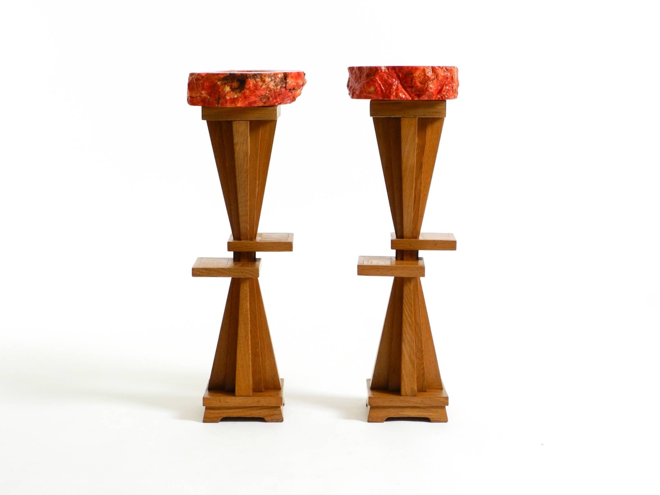 Two mid-century standing ashtrays consisting of red Alabaster cup