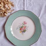 Pitted old flat earthenware plates with gold