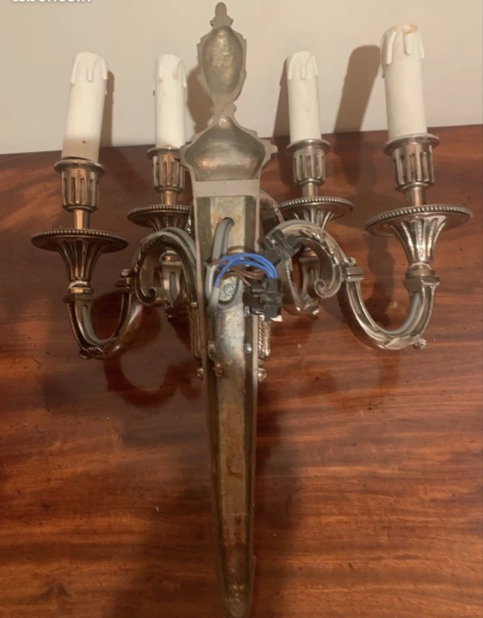 Bronze and silver wall sconce