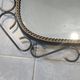Mid-century modern iron mirror, brutalist, vintage organic, thick sixties.