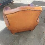Pair of club chairs with mustaches in havana leather in their juices circa 1930