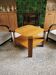 Square art deco coffee table in light wood