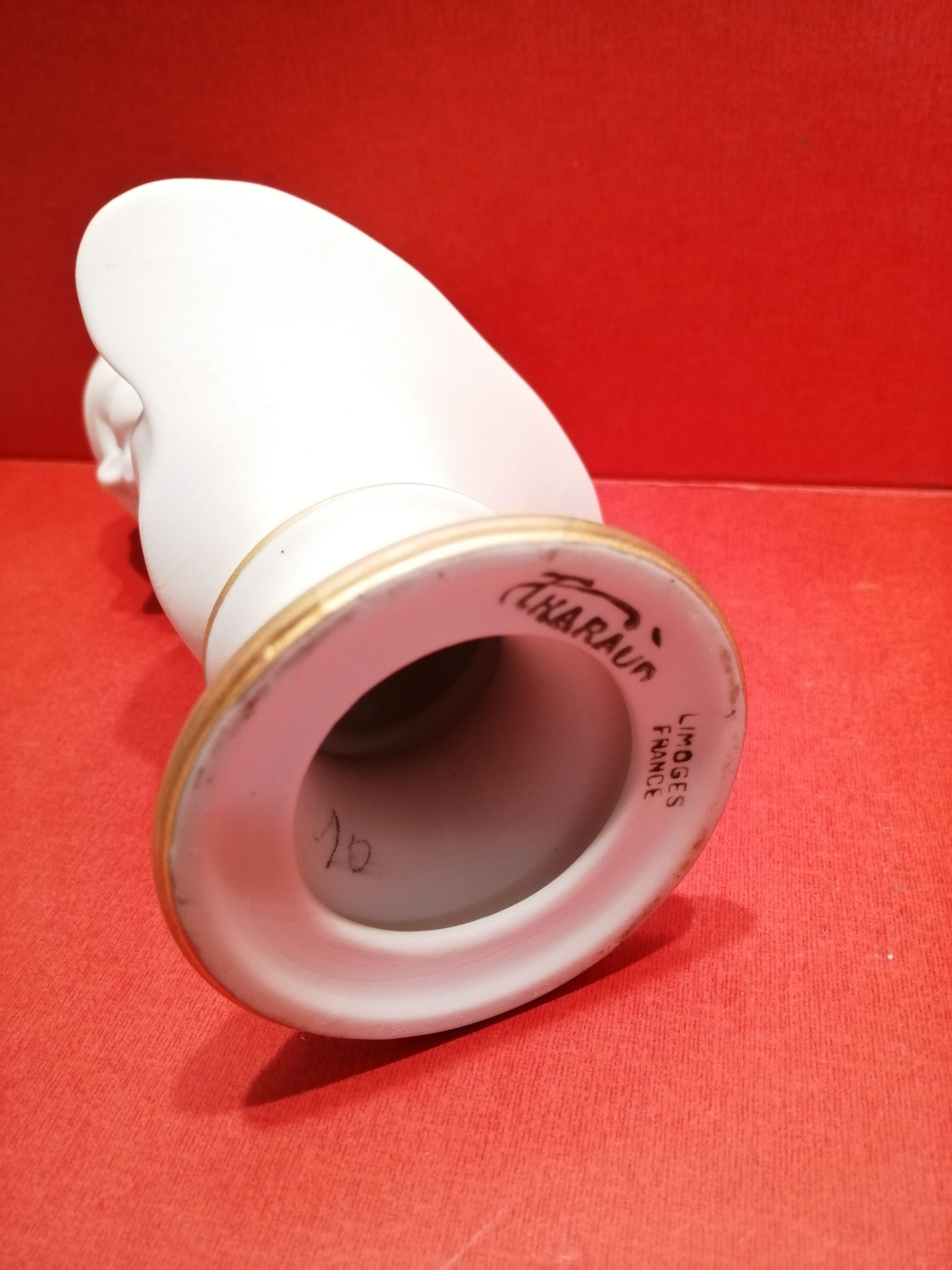 Small bust young boy in biscuit Tharaud Limoges