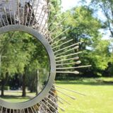 Gold metal sun mirror