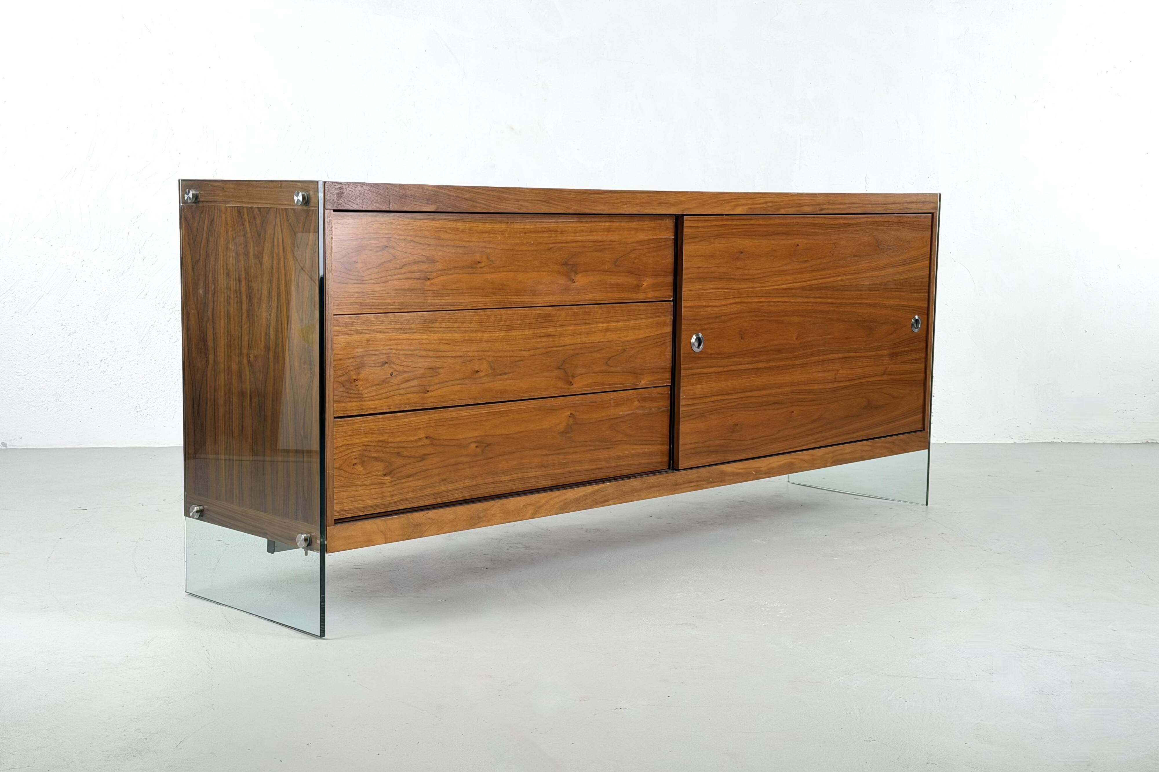 Teak sideboard with glass legs, France - 1990s