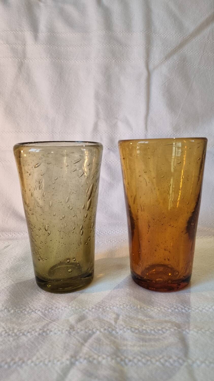 2 water glasses or blown cocktail glasses
