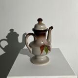 Vintage stoneware teapot with flower and fruit patterns