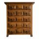 Antique solid wood chest of drawers with five drawers.