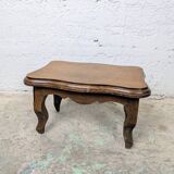 Antique footstool with rustic charm