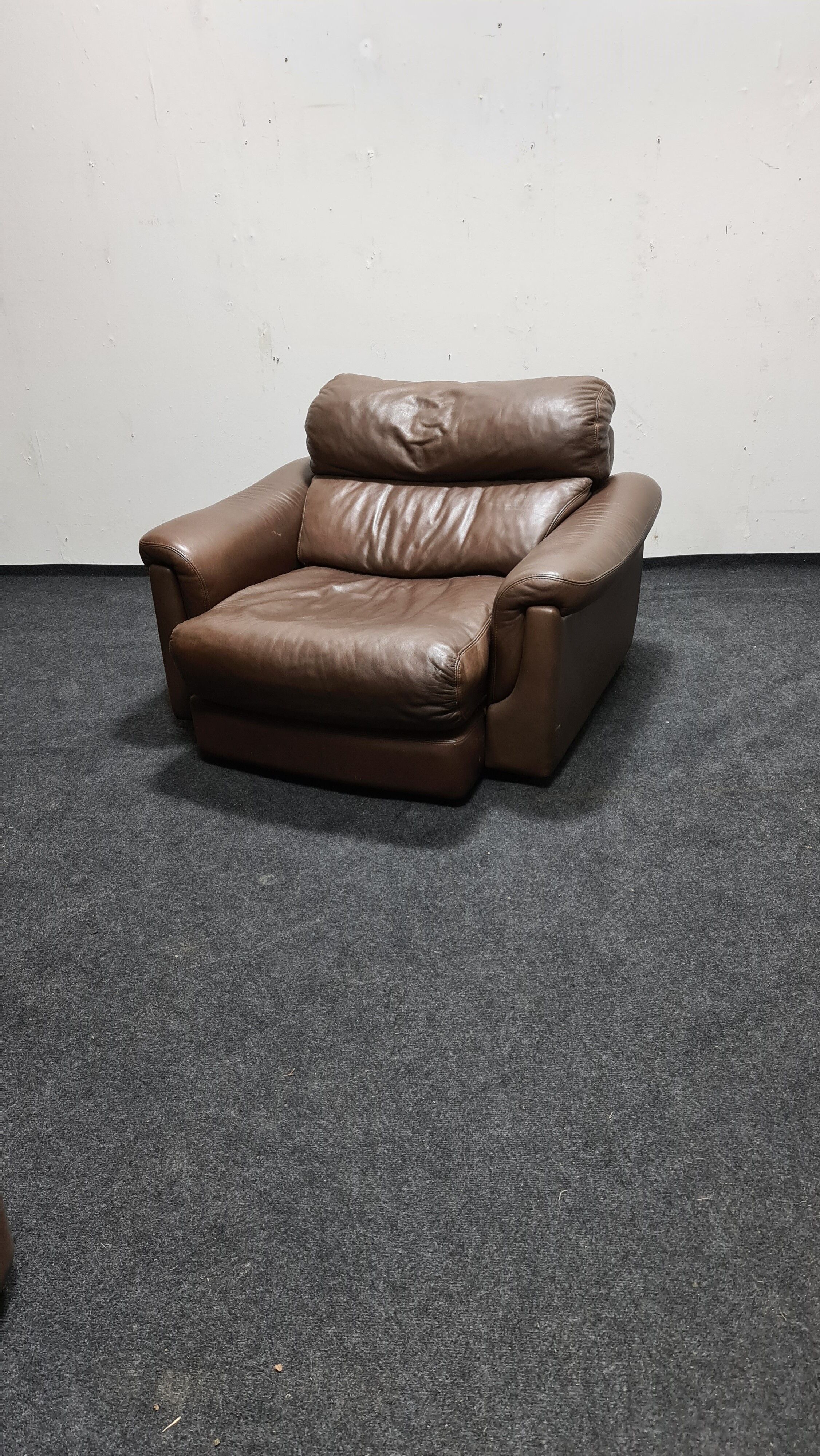 Fauteuil Rolf Benz en cuir brun vintage