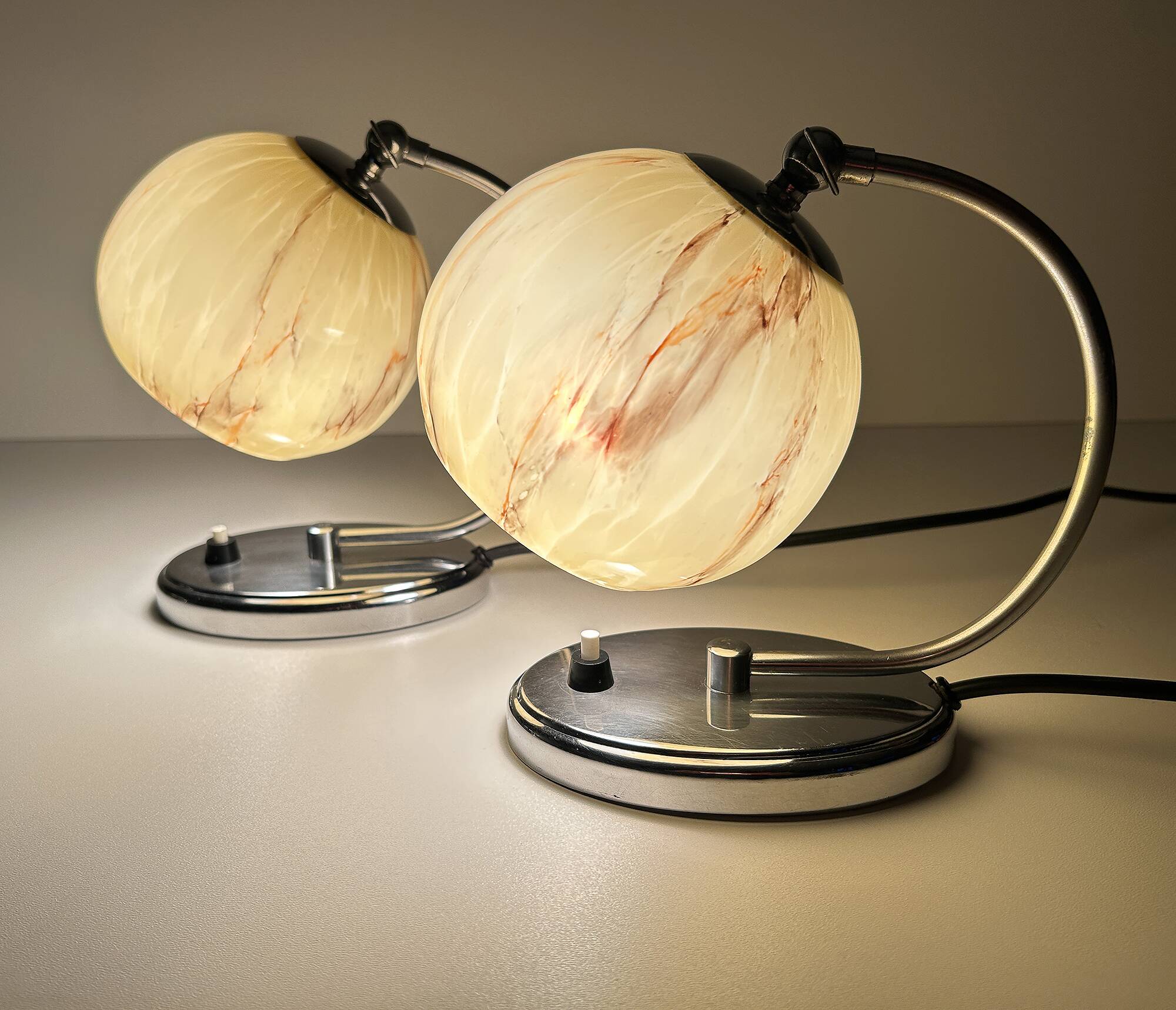 Pair of art deco lamps, chrome glass