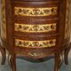 Vintage 1940s demi-lune buffet in burr walnut and satin wood.