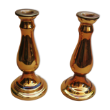 Pair of equalized candle holders with silvering, mixed gilding