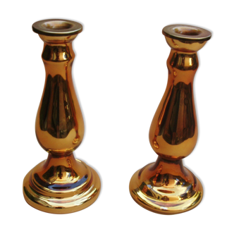 Pair of equalized candle holders with silvering, mixed gilding