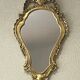 Miroir baroque bois et stuc doré style Louis XV - 37 x 64 cm
