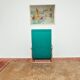 Turquoise armchair with folding footrest, 1960s