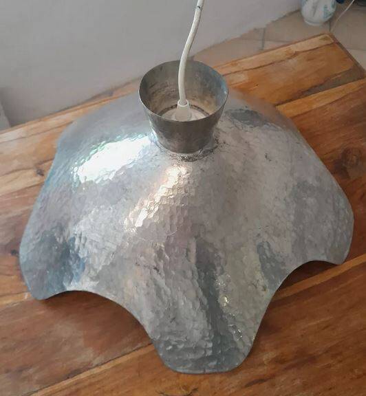 Hammered sheet metal suspension