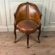 Louis XV style office chair in carved wood, brown leather, circa 1920.