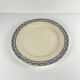 Round plate made of iron earth from Salins, late 19th century - early 20th century.