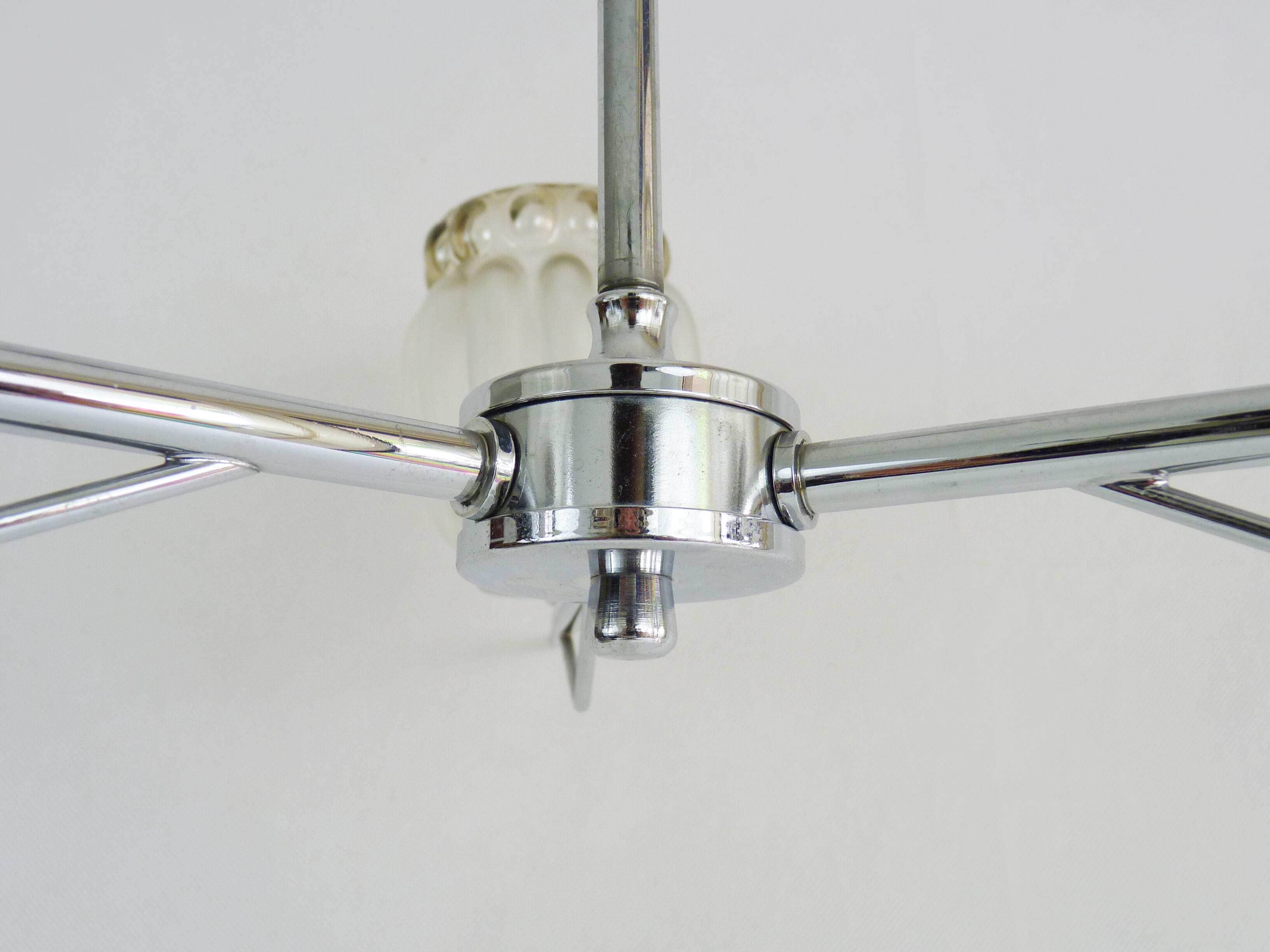 Vintage chandelier with 3 branches in chrome metal and glass globe. Year 70