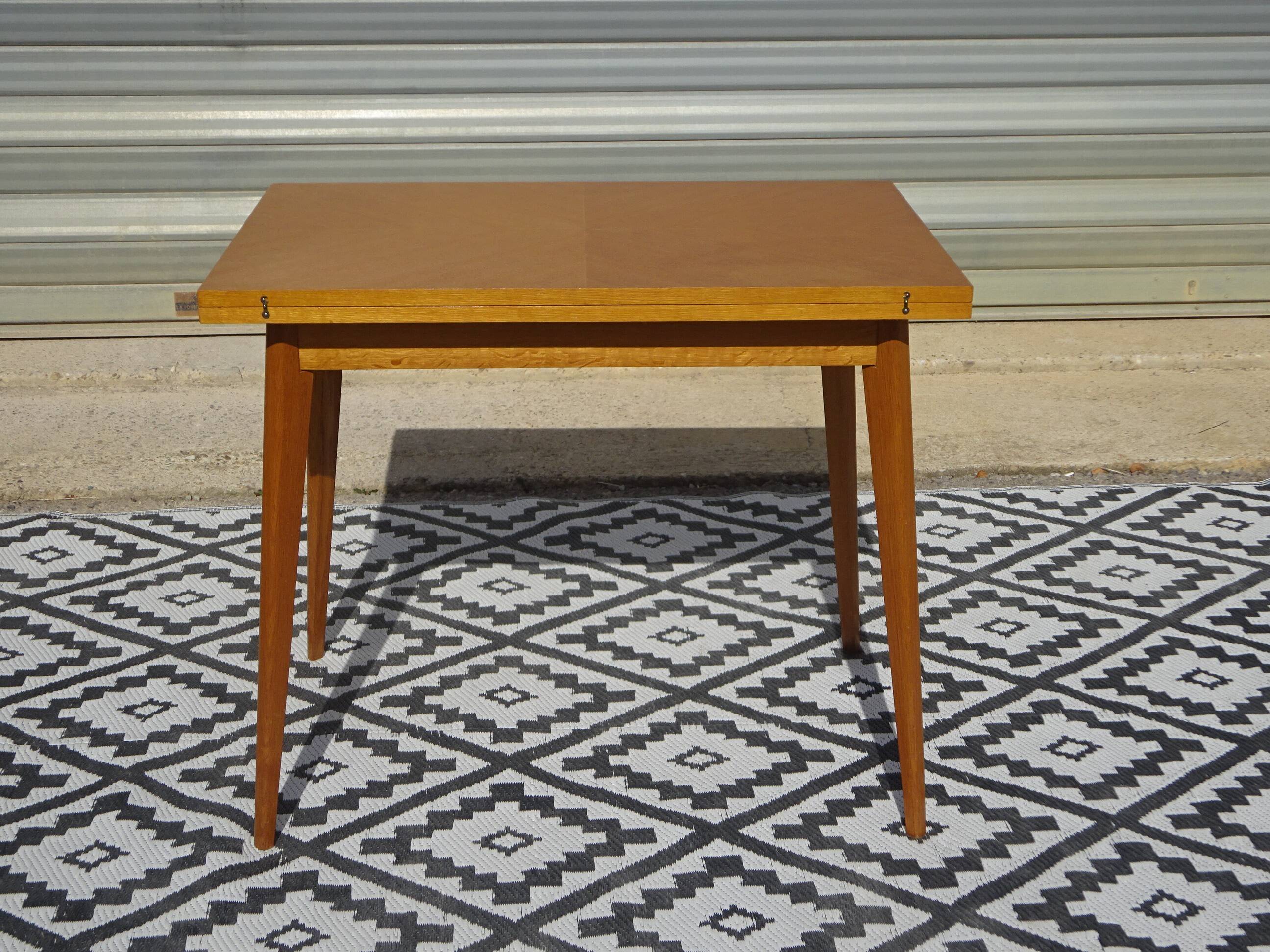 Scandinavian portfolio table model "half-century" by SAM