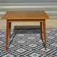 Scandinavian portfolio table model "half-century" by SAM
