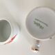 Y. Ginther porcelain jar and toilet jar