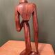 Wooden sculpture inspired by Rodin's "The Thinker"